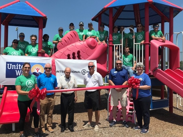 IP and United Way volunteers host a ribbon cutting of the Born Learning Trail at West Craven Park in Vanceboro, N.C.